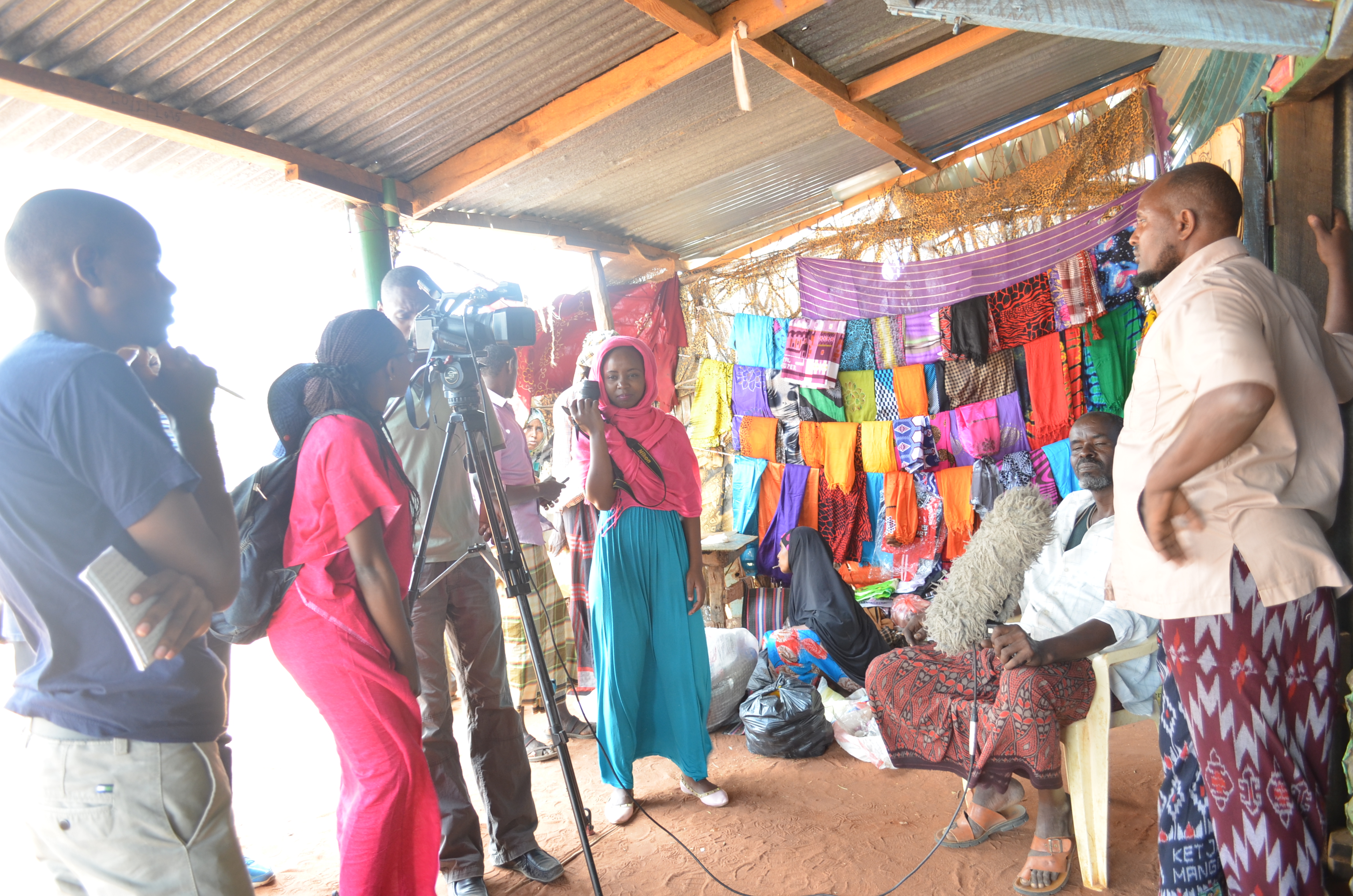 Journalists from NTV, K24 and the Standard interviewing a HSNP beneficiary from Wagalla, Wajir